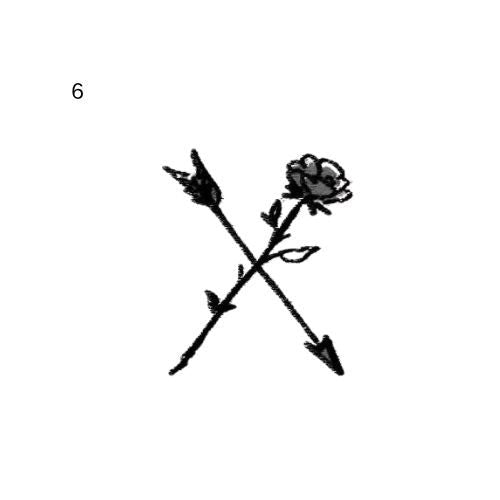 rough ink sketch temporary tattoo featuring arrow and rose
