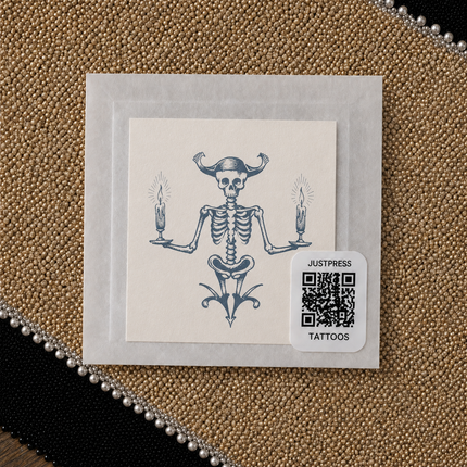 Candle Bearer Skeleton Temporary Tattoo - JUST PRESS physical packaging image