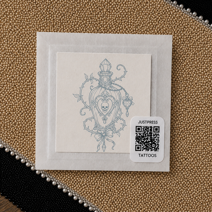Thorn Apothecary Bottle Wrist Temporary Tattoo - JUST PRESS physical packaging image